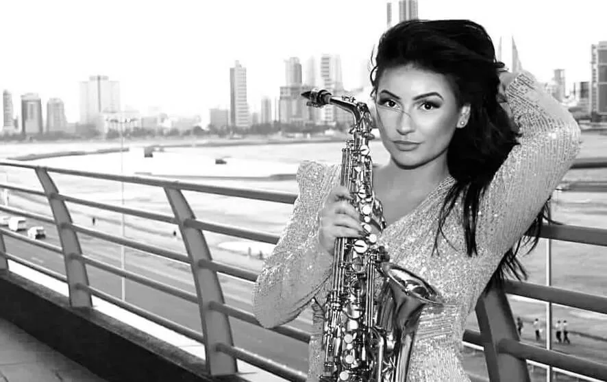 За KristinSAX